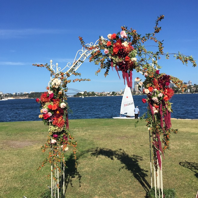 wedding arch with medium floral coverage