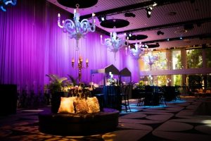 Large event room with purple backlit stage